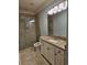 Bathroom featuring a walk-in shower and white vanity at 1426 Saint Thomas Circle # A 3, Myrtle Beach, SC 29577