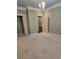 Bedroom featuring a chandelier, closet, and entry way at 1426 Saint Thomas Circle # A 3, Myrtle Beach, SC 29577