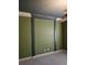 Large green bedroom with unique trim design along the wall at 1426 Saint Thomas Circle # A 3, Myrtle Beach, SC 29577