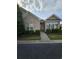 Attractive brick home with well-maintained landscaping and inviting front entrance at 1426 Saint Thomas Circle # A 3, Myrtle Beach, SC 29577