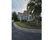 Beautiful brick home featuring manicured bushes, mature trees and well-maintained landscaping at 1426 Saint Thomas Circle # A 3, Myrtle Beach, SC 29577