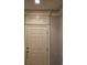 Close-up of a classic white front door with decorative molding and a neutral-colored wall at 1426 Saint Thomas Circle # A 3, Myrtle Beach, SC 29577