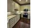 Modern kitchen with stainless steel appliances, granite countertops, and shaker-style cabinets at 1426 Saint Thomas Circle # A 3, Myrtle Beach, SC 29577