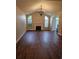 Bright and airy living room with hardwood floors, a fireplace, high ceilings and natural light at 1426 Saint Thomas Circle # A 3, Myrtle Beach, SC 29577