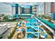 A thrilling waterpark with colorful slides, connecting bridge and the ocean as backdrop at 1501 S Ocean Blvd. # 1232, Myrtle Beach, SC 29577