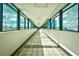 Hallway with large windows featuring views of the building's exterior at 1501 S Ocean Blvd. # 1232, Myrtle Beach, SC 29577