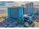 Aerial view of a beachfront hotel with a large parking area and stunning ocean views at 1501 S Ocean Blvd. # 1410, Myrtle Beach, SC 29577