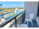 Condo balcony with a distant view of a water park and other resort amenities at 1501 S Ocean Blvd. # 1410, Myrtle Beach, SC 29577