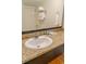 Bathroom vanity with granite countertop, sink, and mirror at 1501 S Ocean Blvd. # 1410, Myrtle Beach, SC 29577