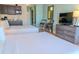 Light bedroom offering two beds, kitchenette, a table with chairs, and a pleasant stay at 1501 S Ocean Blvd. # 1410, Myrtle Beach, SC 29577