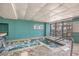 Indoor hot tub with jets and brick pavers, featuring a waterfall feature and poolside seating at 1501 S Ocean Blvd. # 1410, Myrtle Beach, SC 29577