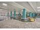 Relaxing indoor pool with lazy river, plants, and ample seating at 1501 S Ocean Blvd. # 1410, Myrtle Beach, SC 29577