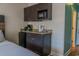 Convenient kitchenette area with a microwave, coffeemaker, and sink, perfect for a comfortable stay at 1501 S Ocean Blvd. # 1410, Myrtle Beach, SC 29577