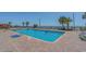 Outdoor pool with ocean view and chairs for relaxing in the sun at 1501 S Ocean Blvd. # 1410, Myrtle Beach, SC 29577
