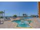 Outdoor pool and hot tub with ocean views and plenty of lounge seating at 1501 S Ocean Blvd. # 1410, Myrtle Beach, SC 29577