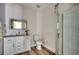 Modern bathroom with a frameless glass shower door, a sleek vanity, and contemporary fixtures at 1673 Carriage Ln., Little River, SC 29566