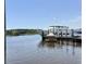 Docked cruise boat with a tiki hut floating on the water in front of the vessel at 1673 Carriage Ln., Little River, SC 29566
