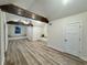 Inviting bonus room featuring rustic wooden beams, window seats, and a vaulted ceiling at 1673 Carriage Ln., Little River, SC 29566