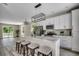 A large kitchen with stainless steel appliances and marble countertops at 1673 Carriage Ln., Little River, SC 29566