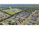 Aerial view showcases community layout, green spaces, and nearby amenities, including a highway at 2029 Silvercrest Dr. # 22B, Myrtle Beach, SC 29579