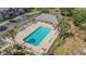 Aerial view of a pool area with lounge chairs, landscaping and community amenities at 2029 Silvercrest Dr. # 22B, Myrtle Beach, SC 29579