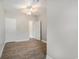 This bedroom has wood-look floors, a ceiling fan, and doors to other rooms at 2029 Silvercrest Dr. # 22B, Myrtle Beach, SC 29579