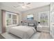 Comfortable bedroom with a ceiling fan, hardwood floors, and views of the community at 2029 Silvercrest Dr. # 22B, Myrtle Beach, SC 29579