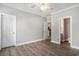 Spacious bedroom featuring a ceiling fan and easy access to a private bathroom at 2029 Silvercrest Dr. # 22B, Myrtle Beach, SC 29579