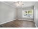 Bright bedroom featuring a ceiling fan, crown moulding, and natural light at 2029 Silvercrest Dr. # 22B, Myrtle Beach, SC 29579