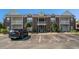 A charming brick condo building features upper and lower balconies in a landscaped community at 2029 Silvercrest Dr. # 22B, Myrtle Beach, SC 29579