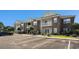 Charming two-story brick condo building featuring balconies and well-maintained landscaping at 2029 Silvercrest Dr. # 22B, Myrtle Beach, SC 29579