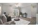 Cozy living room featuring a ceiling fan, hardwood floors, and access to outdoor patio at 2029 Silvercrest Dr. # 22B, Myrtle Beach, SC 29579