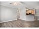Open-concept living room featuring hardwood floors and a view of the kitchen at 2029 Silvercrest Dr. # 22B, Myrtle Beach, SC 29579
