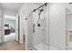 Modern bathroom featuring a sleek glass-enclosed shower and a view into the toilet room at 205 Marsh Deer Place, Surfside Beach, SC 29575