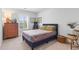 Bedroom featuring natural light, neutral walls, and a modern bed with colorful accents at 205 Marsh Deer Place, Surfside Beach, SC 29575