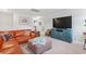 Comfortable upstairs bonus room with a TV, leather sofa, and stylish decor at 205 Marsh Deer Place, Surfside Beach, SC 29575
