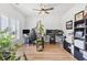 Bright office space with hardwood floors, ceiling fan, and plenty of natural light at 205 Marsh Deer Place, Surfside Beach, SC 29575