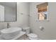 Bathroom features a modern sink, toilet, window and shower at 2072 Haystack Way, Myrtle Beach, SC 29579