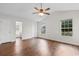 Bedroom featuring hardwood floors, vaulted ceiling, and large windows at 2072 Haystack Way, Myrtle Beach, SC 29579