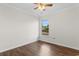 Bedroom featuring a ceiling fan, window view and wood floor at 2072 Haystack Way, Myrtle Beach, SC 29579