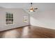 Bedroom with hardwood floors, vaulted ceiling, and large windows at 2072 Haystack Way, Myrtle Beach, SC 29579