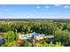 Aerial shot of large community pool with lounge chairs and trees at 2072 Haystack Way, Myrtle Beach, SC 29579