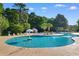 Community pool area featuring a zero entry area, fountains and palm trees at 2072 Haystack Way, Myrtle Beach, SC 29579