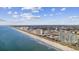Aerial view of beachfront condos complex on the beach with ocean views, showcasing coastal living at 210 N Ocean Blvd. # 333, North Myrtle Beach, SC 29582