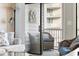 Comfortable seating area on a balcony with partial views, perfect for relaxation at 210 N Ocean Blvd. # 333, North Myrtle Beach, SC 29582