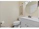 Clean and functional half bathroom with a modern sink, toilet, and neutral decor at 210 N Ocean Blvd. # 333, North Myrtle Beach, SC 29582