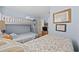 Comfortable bedroom with bunk beds, a twin bed, and tasteful decor with a coastal theme at 210 N Ocean Blvd. # 333, North Myrtle Beach, SC 29582