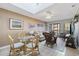A dining area flows into the living room, with cozy seating and ocean-themed decor at 210 N Ocean Blvd. # 333, North Myrtle Beach, SC 29582
