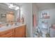 Bathroom featuring a single sink vanity and commode with coastal themed decor at 2100 Sea Mountain Hwy. # 202, North Myrtle Beach, SC 29582