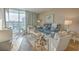 Bright living room with balcony access and comfortable seating at 2100 Sea Mountain Hwy. # 202, North Myrtle Beach, SC 29582